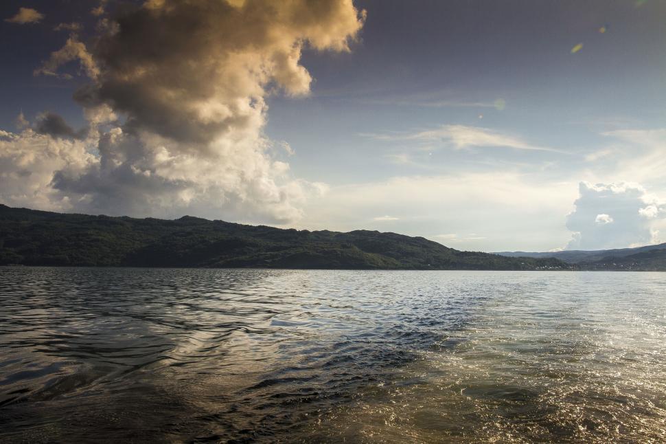 Free Image of Majestic Body of Water Surrounded by Mountains 