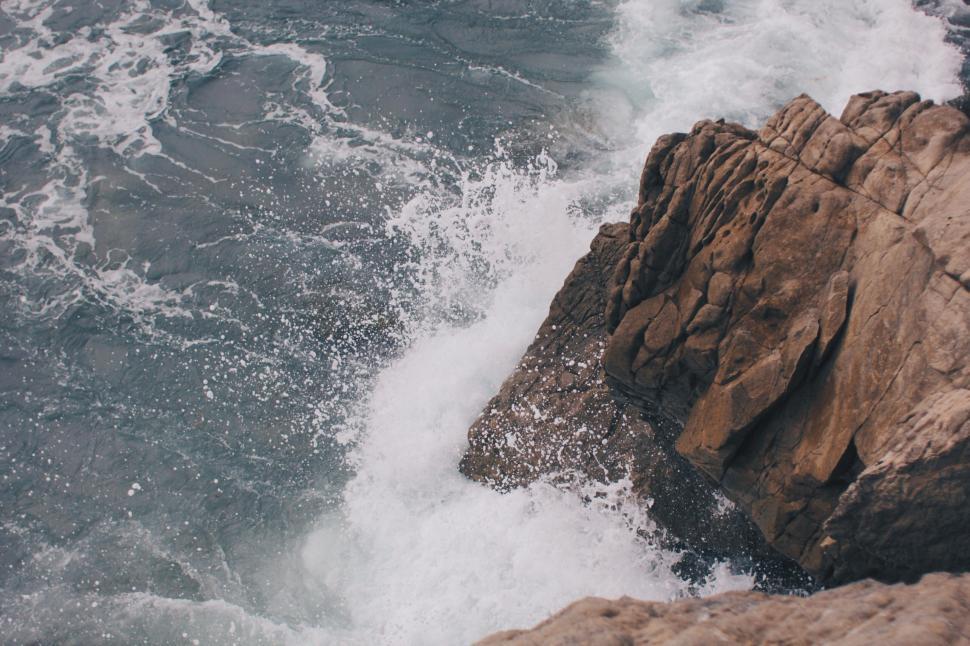 Free Image of Rock Outcropping in the Middle of the Ocean 