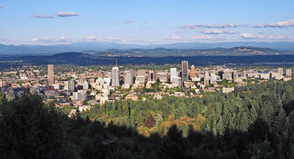 Free Image of Cityscape With Majestic Mountains 