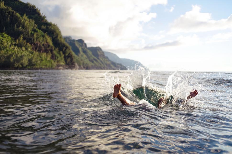 Free Image of Person Swimming in a Lake 