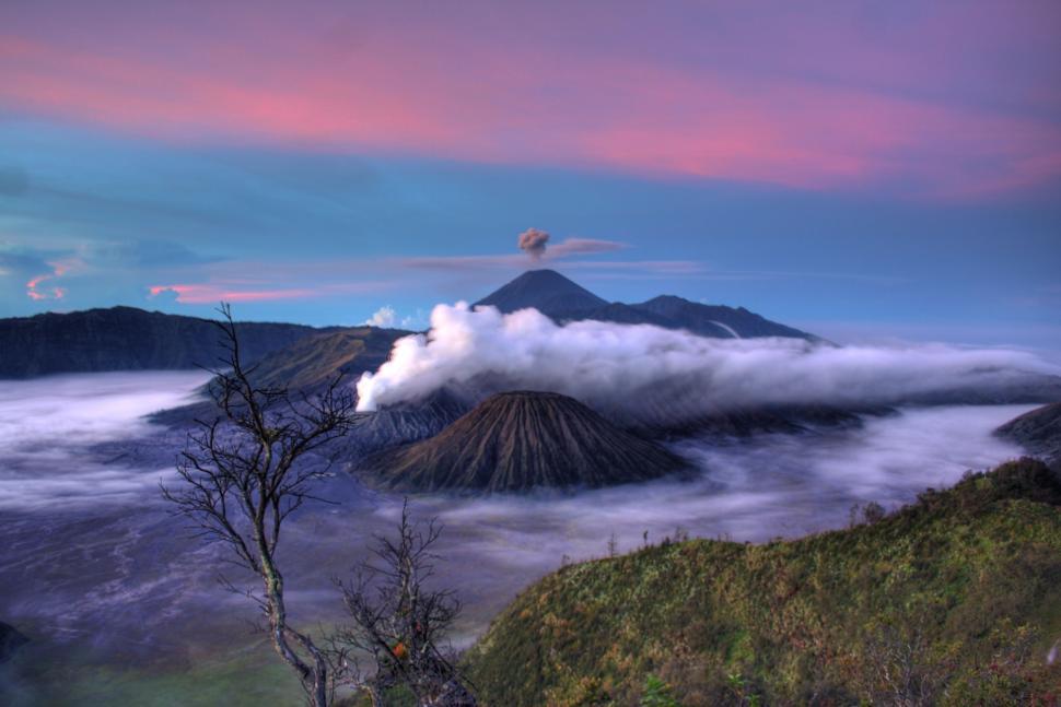 Free Image of Mountain Covered in Clouds 