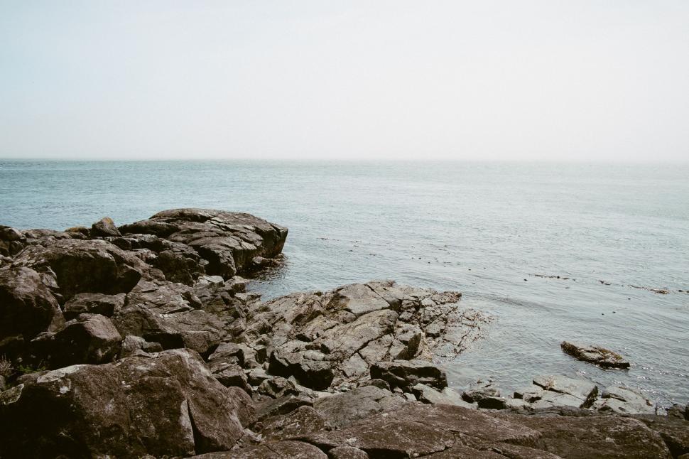 Free Image of Ocean Waves Crashing Against Rocks 