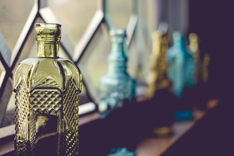 Free Image of Glass Bottle on Window Sill 