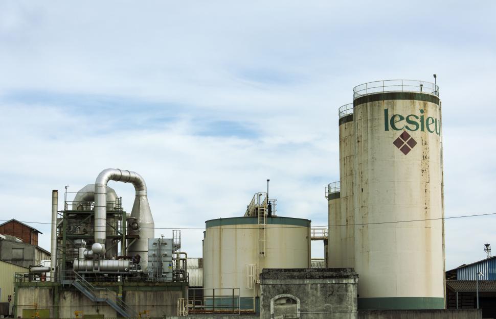 Free Image of Large Factory Building Emitting Smoke 