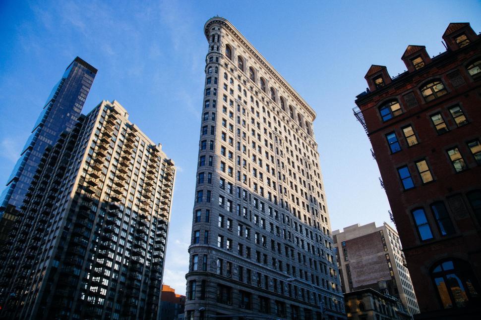 Free Image of Tall Building Overlooking Cityscape 