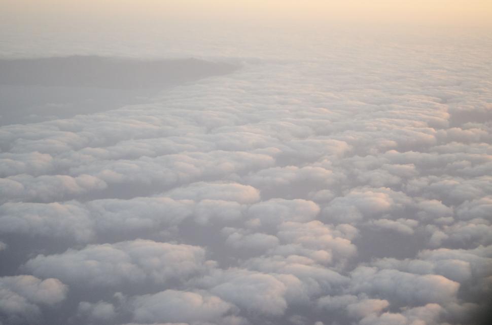 Free Image of A View of Clouds From an Airplane Window 