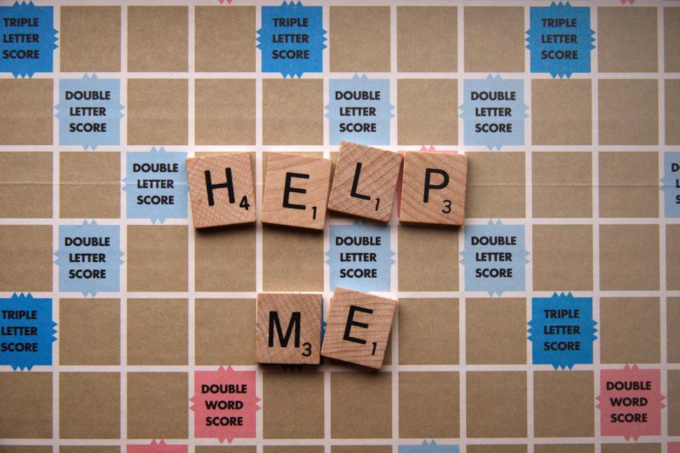 Free Image of Spelling Game says Help Me 