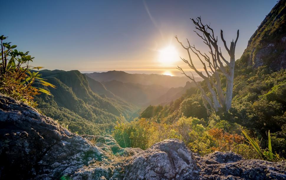 Free Image of Sun Setting Over Mountain Range 