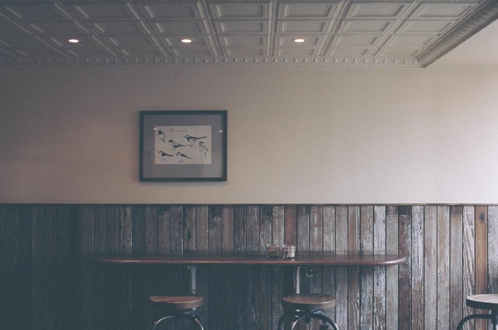 Free Image of Bar With Three Stools and a Table 