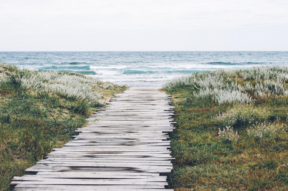 Free Image of Wooden Walkway Leading to Beach 