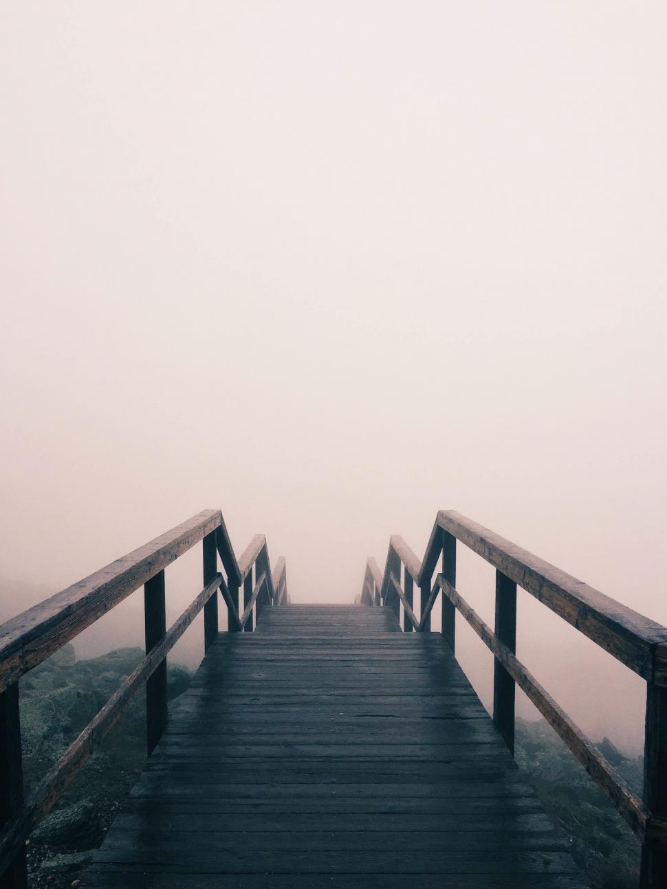 Free Image of Wooden Bridge in Foggy Sky 