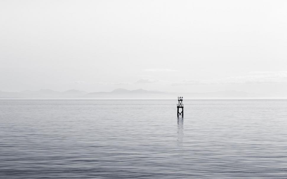 Free Image of Tower Rising in Vast Water 