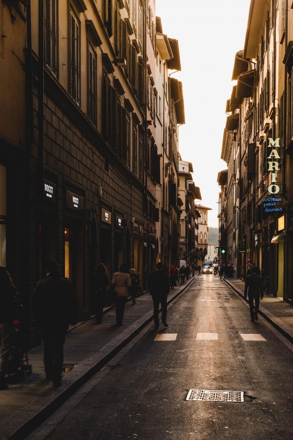 Free Image of Busy City Street With Pedestrians Walking 