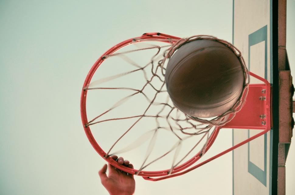 Free Image of Basketball Successfully Going Through the Basketball Hoop 