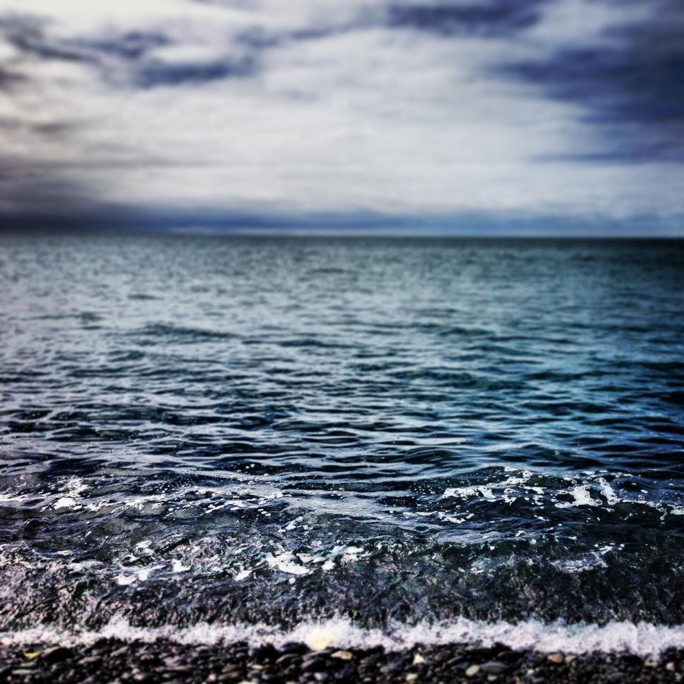 Free Image of Cloudy Sky Reflecting in Still Water 