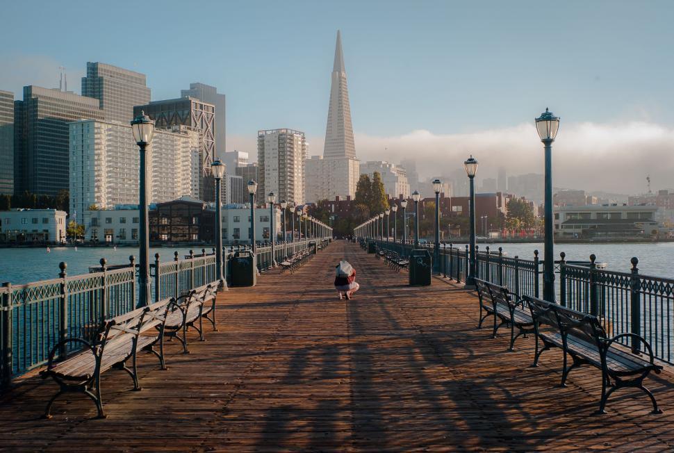 Free Image of Pier With Benches and Street Lamps by Waterfront 