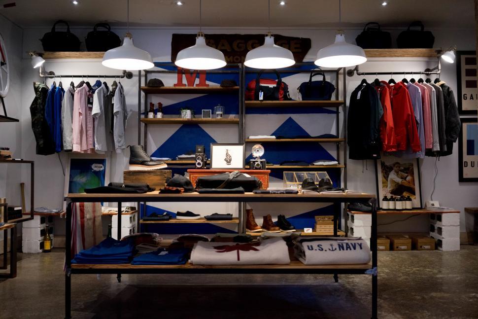 Free Image of Room Filled With Clothes on Shelves 