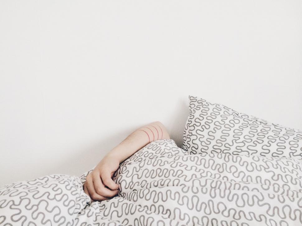 Free Image of Cozy Bed With Pillow and Blanket 