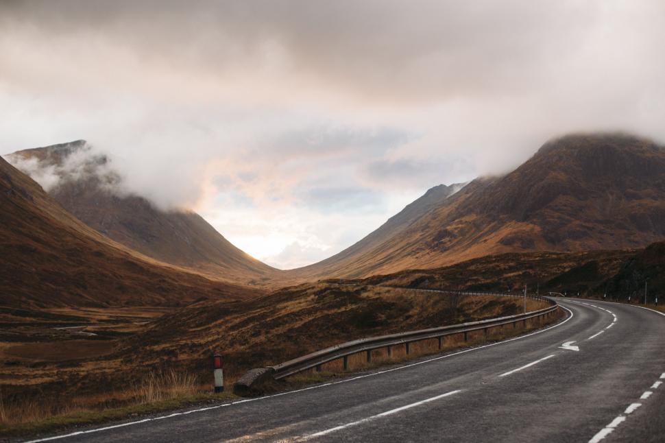 Free Image of A Long Road Leading to Mountains 
