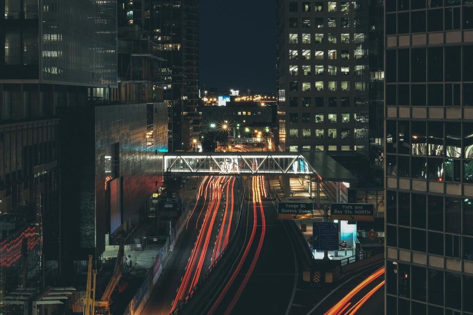 Free Image of A Night View of a City From a Building Top 