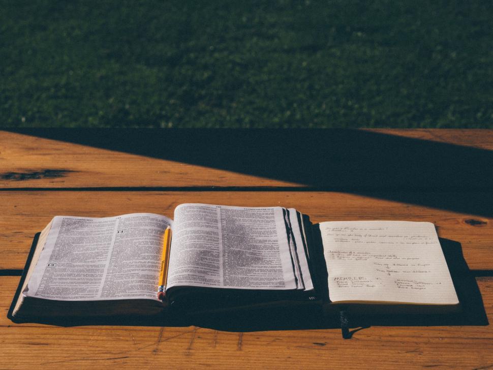 Free Image of Open Book on Wooden Table 