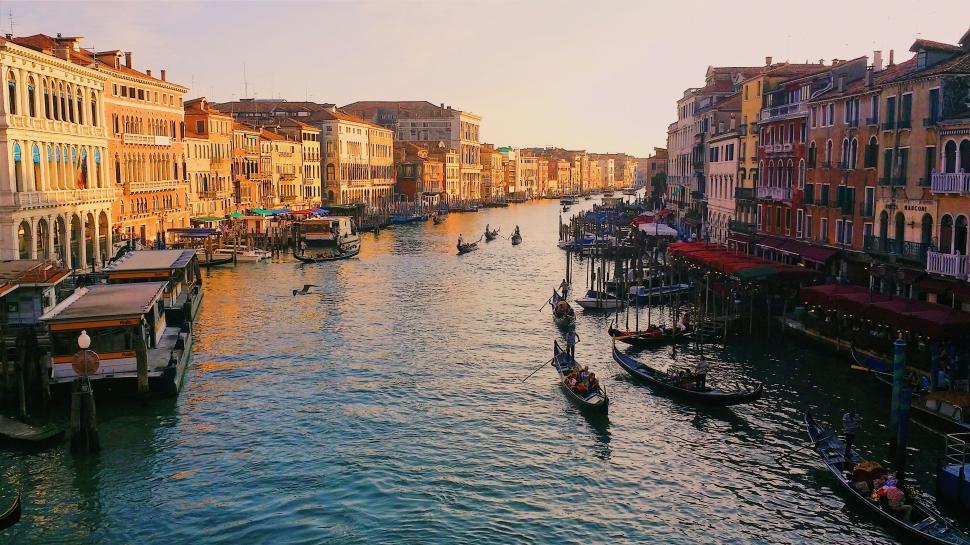 Free Image of Busy Canal With Boats and Buildings 