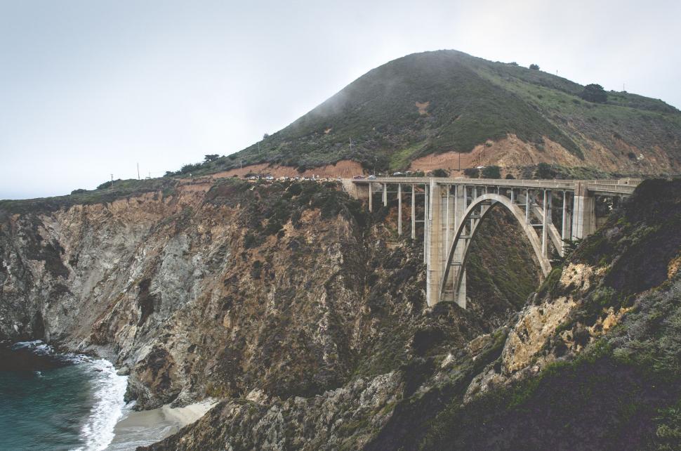 Free Image of Large Bridge Crossing Over a Wide River 