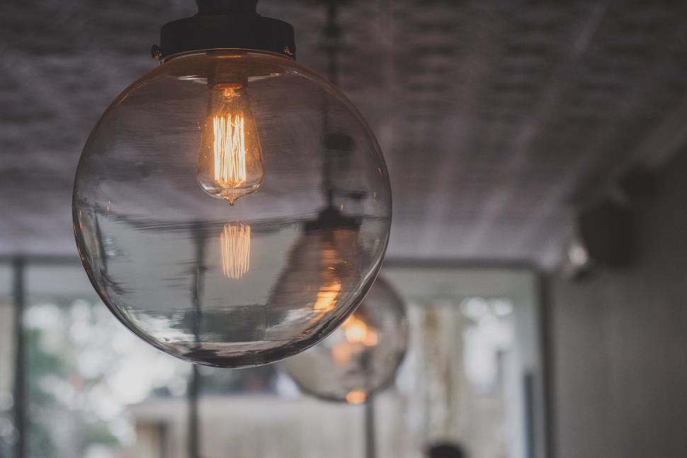 Free Image of Group of Light Bulbs Hanging From Ceiling 
