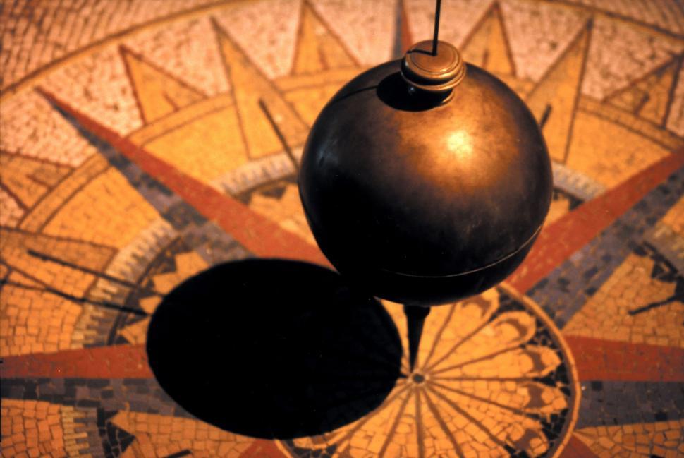 Free Image of Black Object on Tiled Floor 