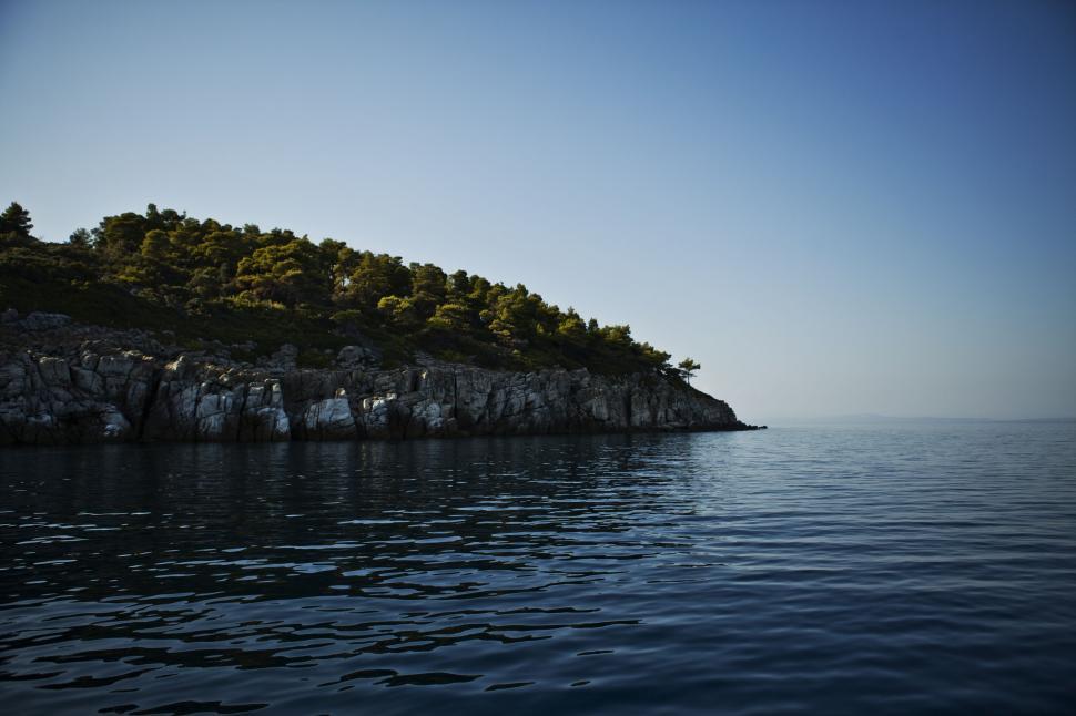 Free Image of Small Island in the Middle of a Body of Water 