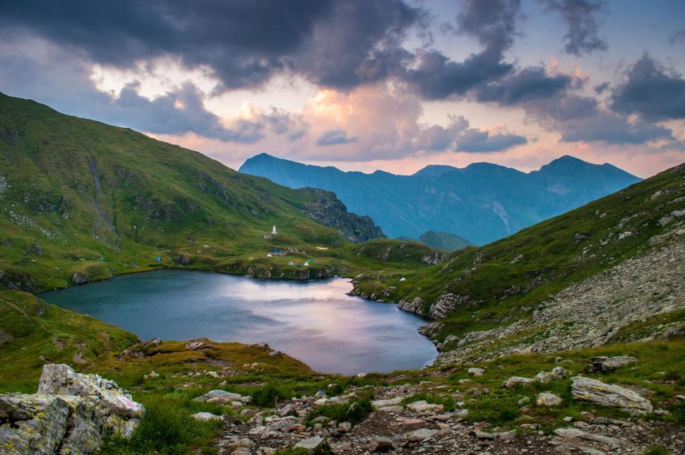 Free Image of Mountainous Lake Under Cloudy Sky 