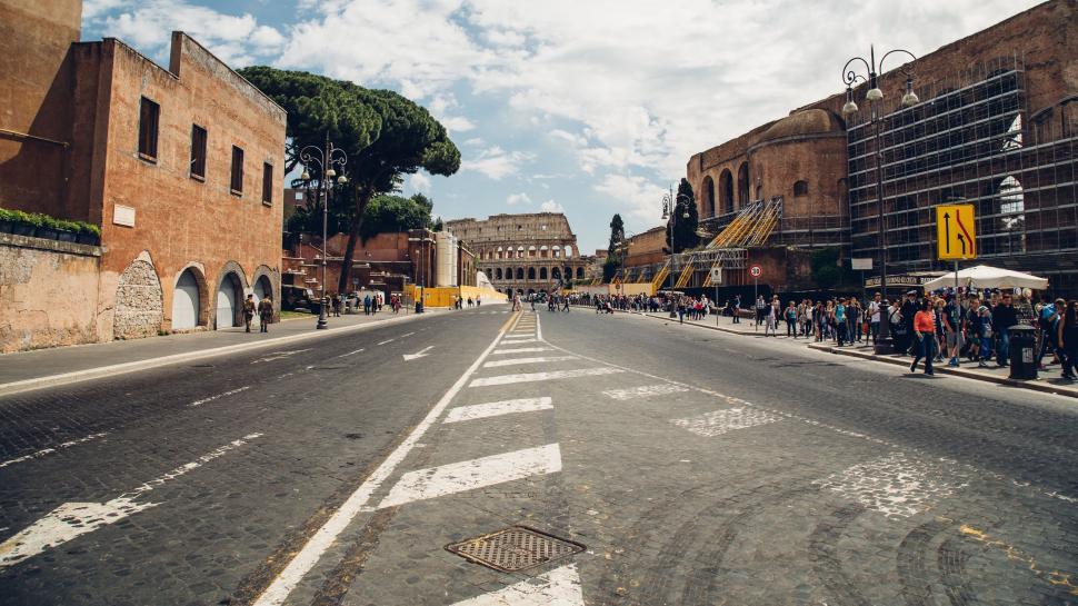 Free Image of Group of People Standing on the Side of a Road 