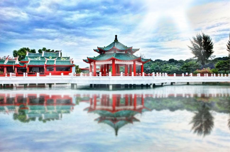 Free Image of White Bridge Crossing Body of Water 