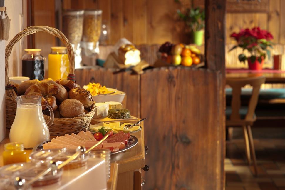 Free Image of Table Filled With Food and Basket of Bread 