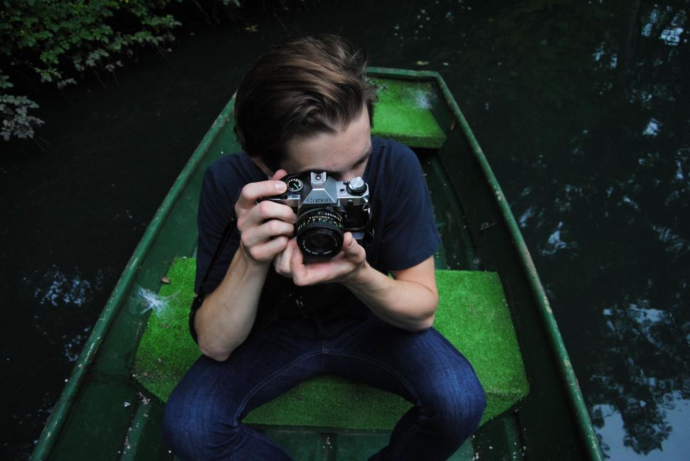 Free Image of Man Taking Selfie in Boat 