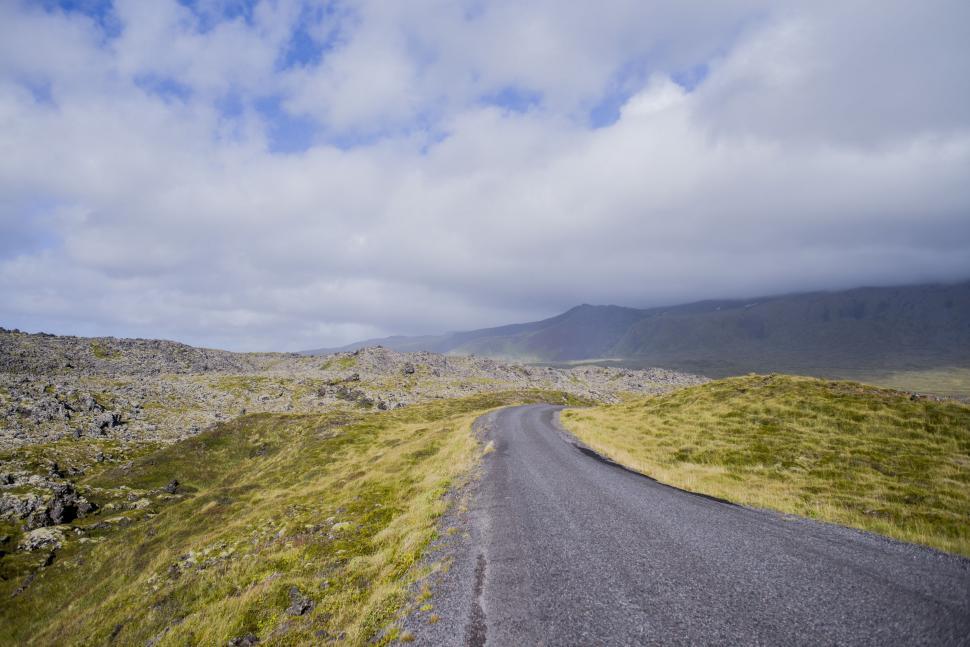 Free Image of Endless Desert Road Cutting Through Arid Landscape 