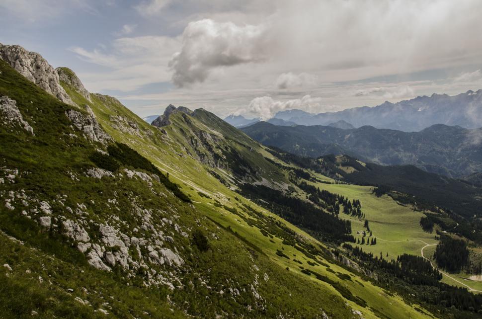 Free Image of Majestic Mountains Towering From Hilltop 