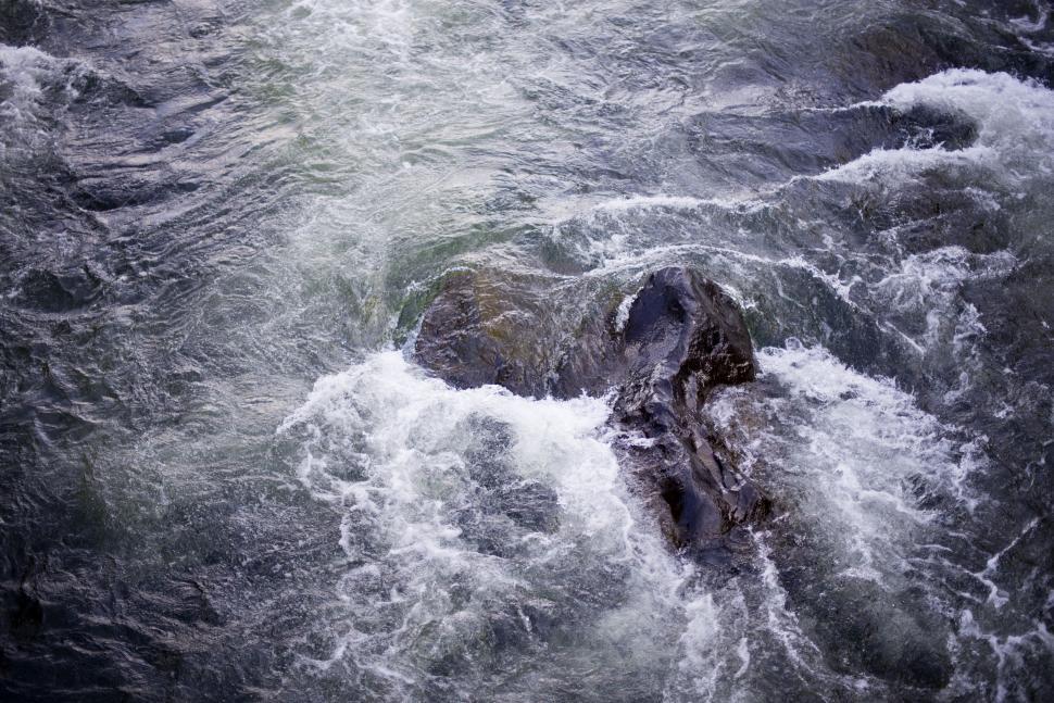 Free Image of Flowing River Cutting Through Landscape 