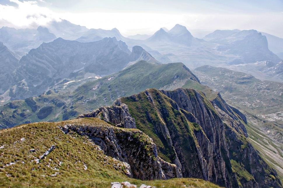 Free Image of View of a Mountain Range From the Top of a Hill 