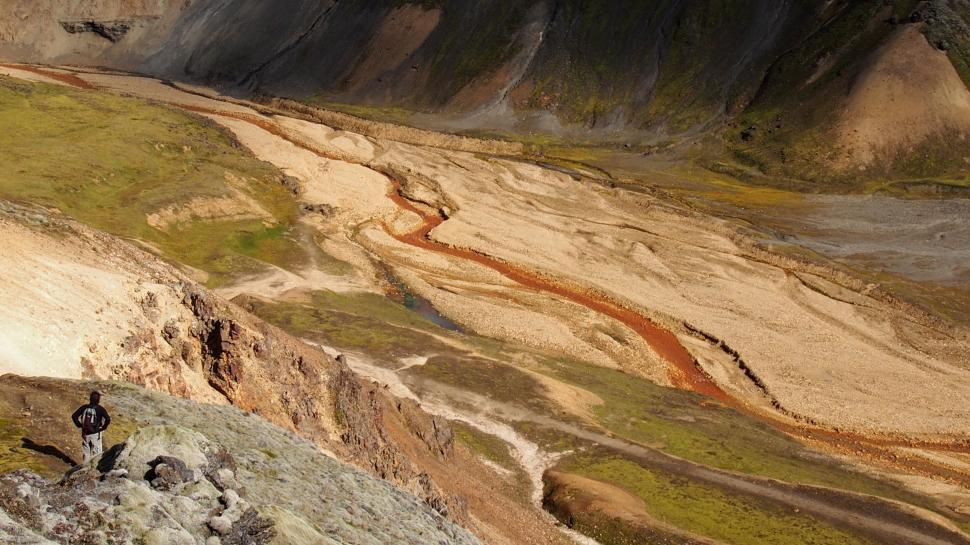 Free Image of Group of People Standing on Top of a Mountain 