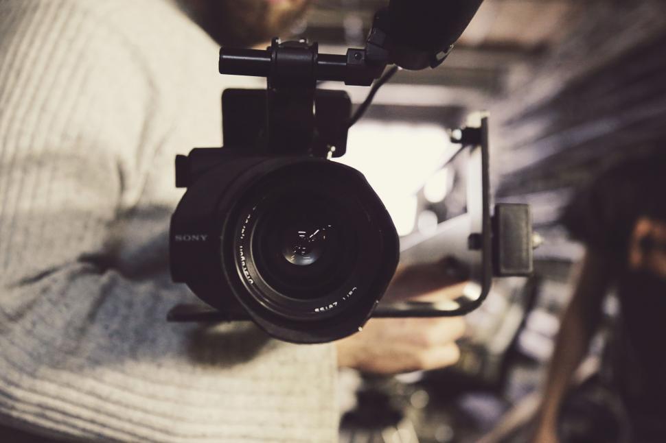 Free Image of Person Holding Camera 