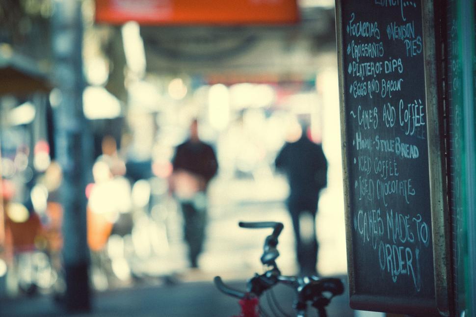Free Image of Bicycle Parked on the Side of a Street 