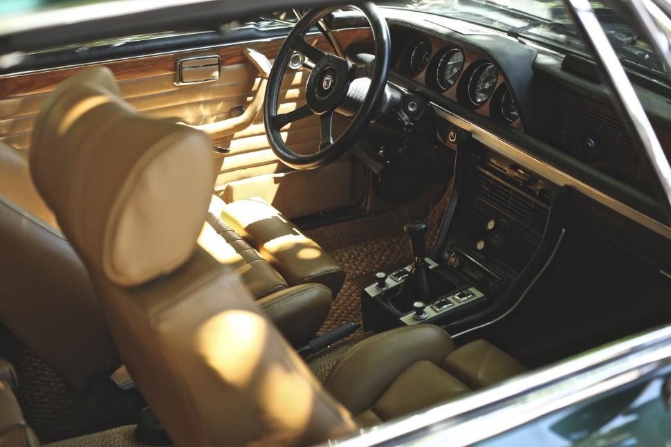 Free Image of Interior of a Car With Steering Wheel and Dashboard 