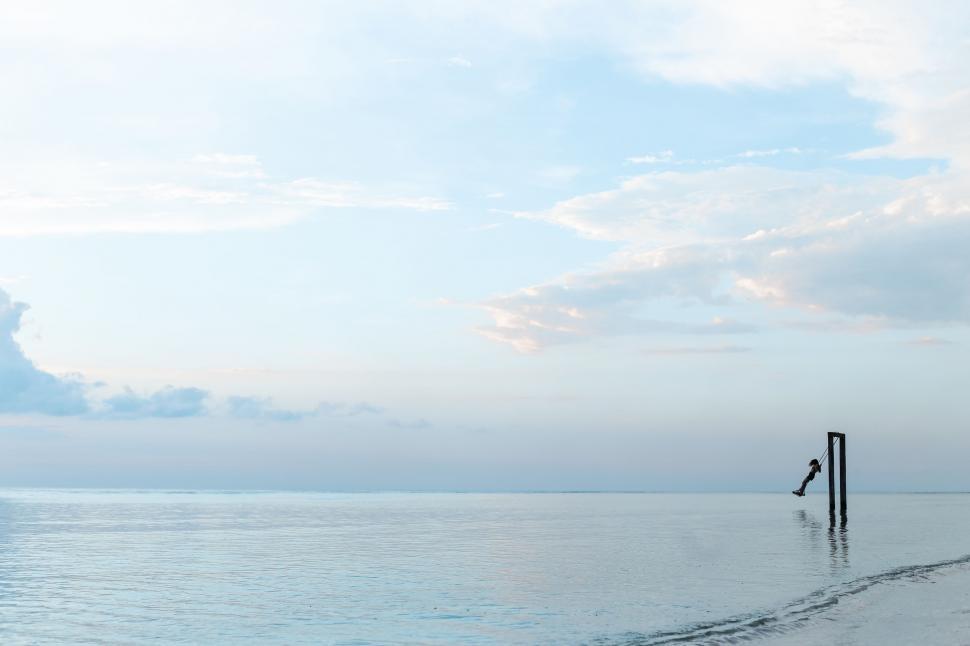 Free Image of Boat Sailing in Distant Waters 