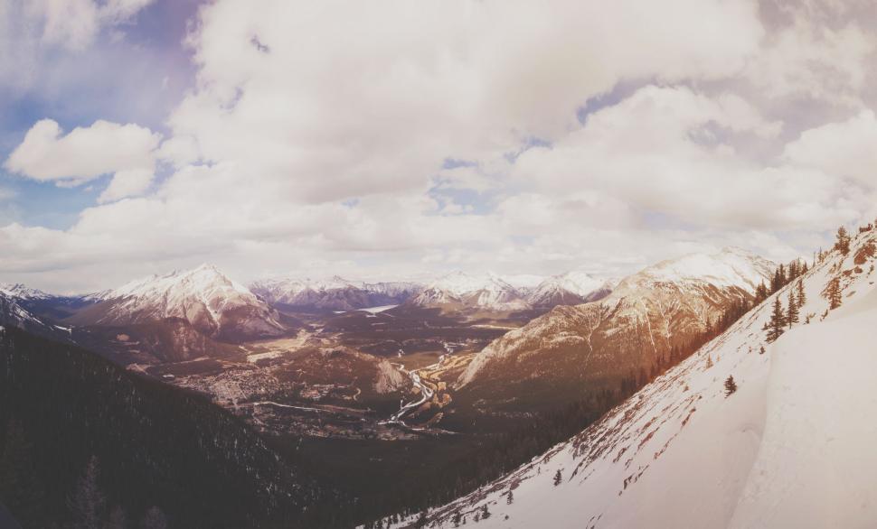 Free Image of Snowboarder Descending Snowy Mountain 