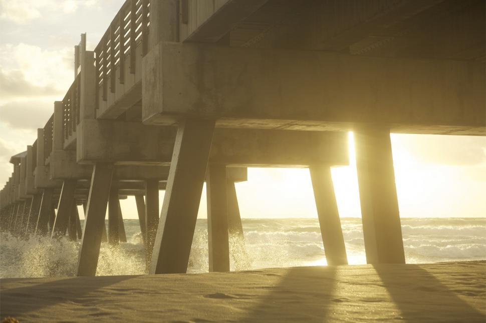 Free Image of Sun Shining Down on Pier 