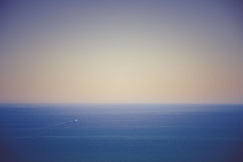 Free Image of Vast Lake Beneath Clear Blue Sky 