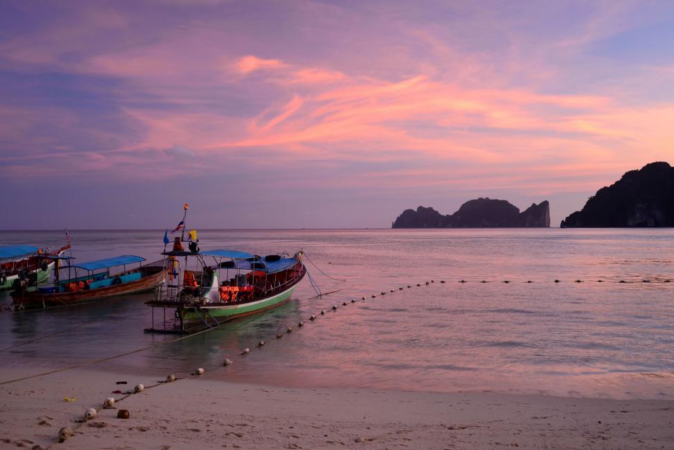 Free Image of Two Boats Moored in Water 