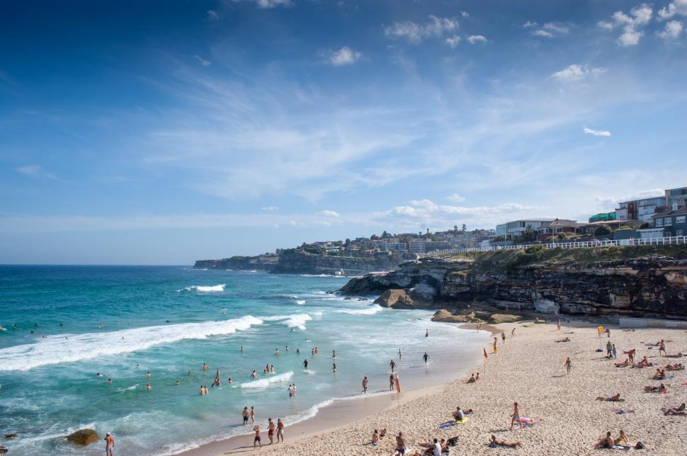 Free Image of A Crowded Beach With Many People 
