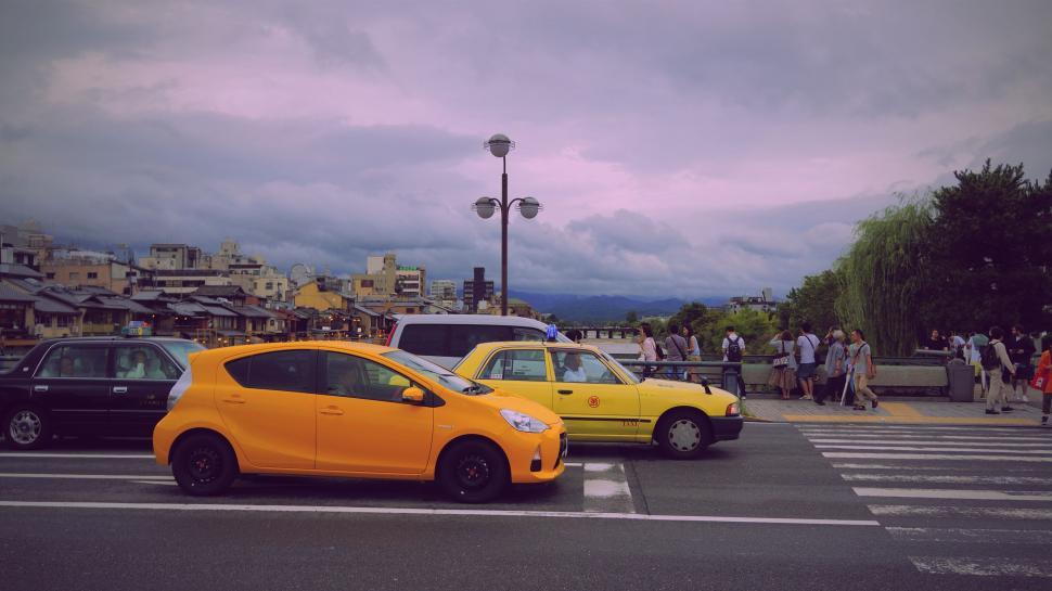 Free Image of Two Cars Parked on the Street 